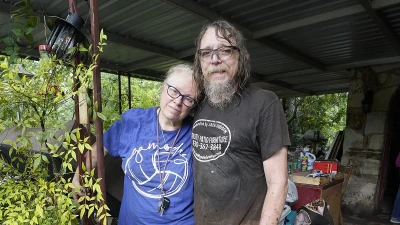 Texas couple trapped by floodwaters survive by clinging onto porch