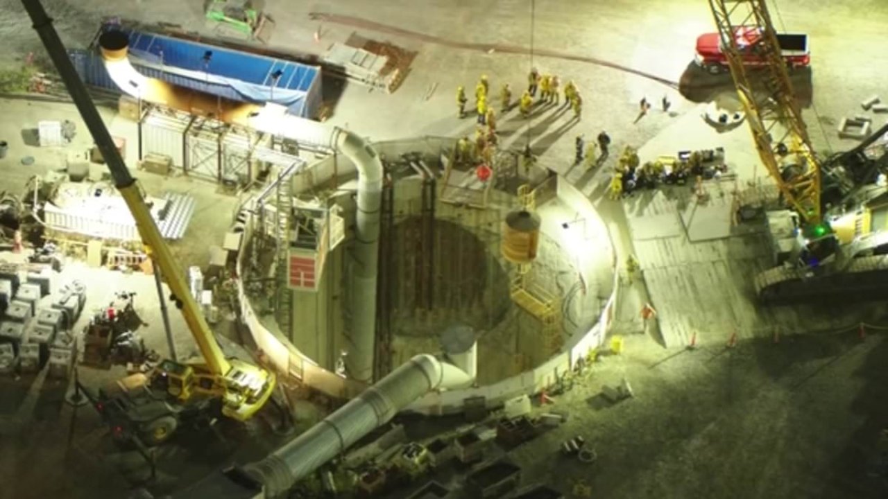Tunnel collapse leaves more than two dozen trapped underground