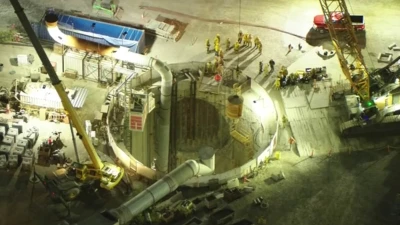 Tunnel collapse leaves more than two dozen trapped underground