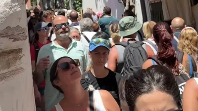 Videos show crowded streets and long queues at Europe holiday hotspots