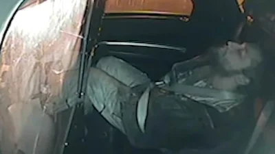 Cop sent intimate texts while suspect died in back of his car