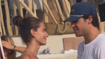 F1 star pictured on holiday with 'most beautiful woman in the world'