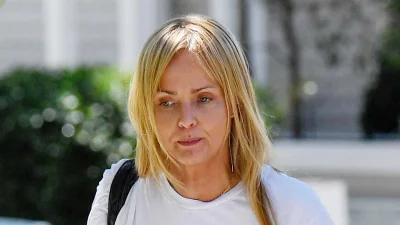 Former Bond girl is seen on a rare outing... can you guess who?