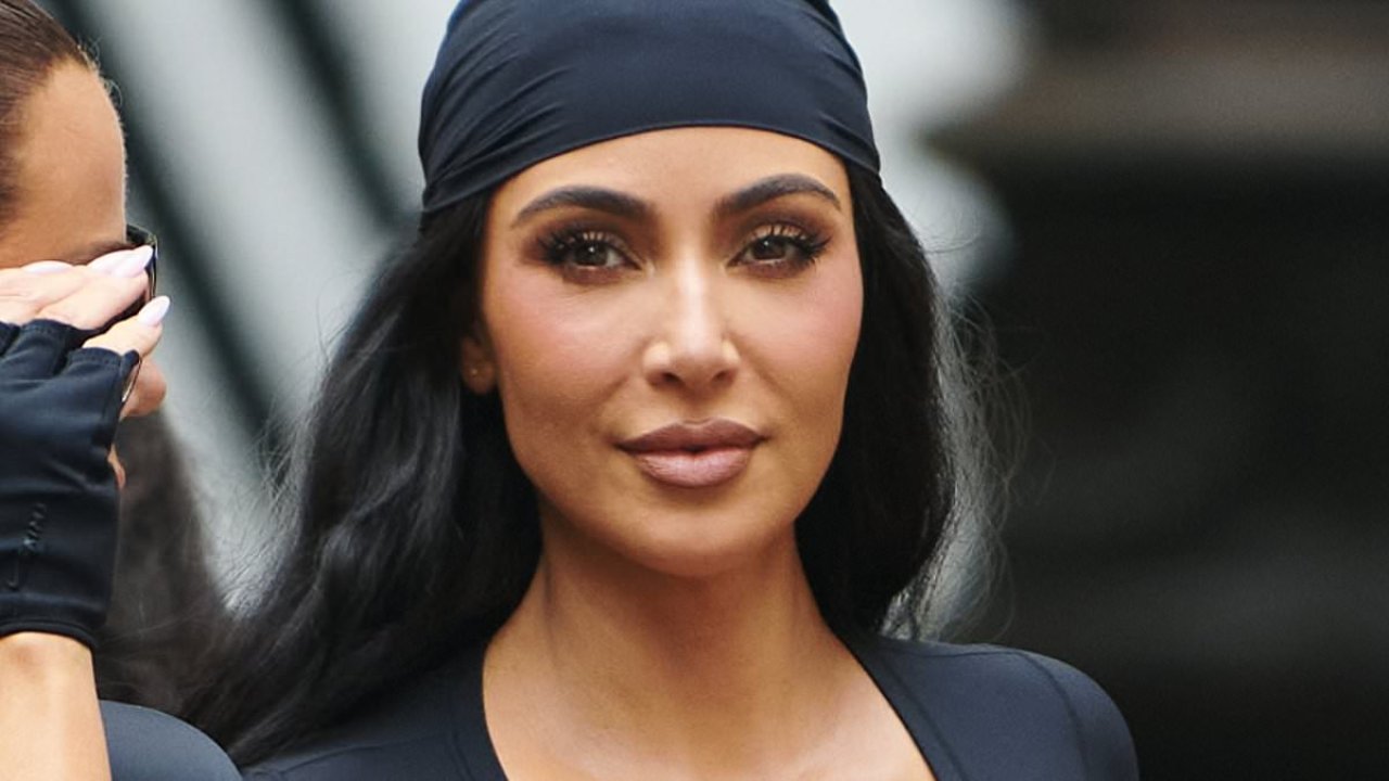 Kim Kardashian models a pirate look while flashing her tummy