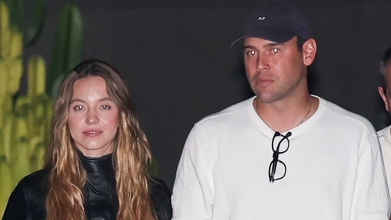 Sydney Sweeney holds hands with Scooter Braun during cozy date night